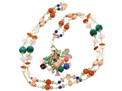 Antike Halskette aus mehreren Edelsteinen und Gelbgold:: um 1930