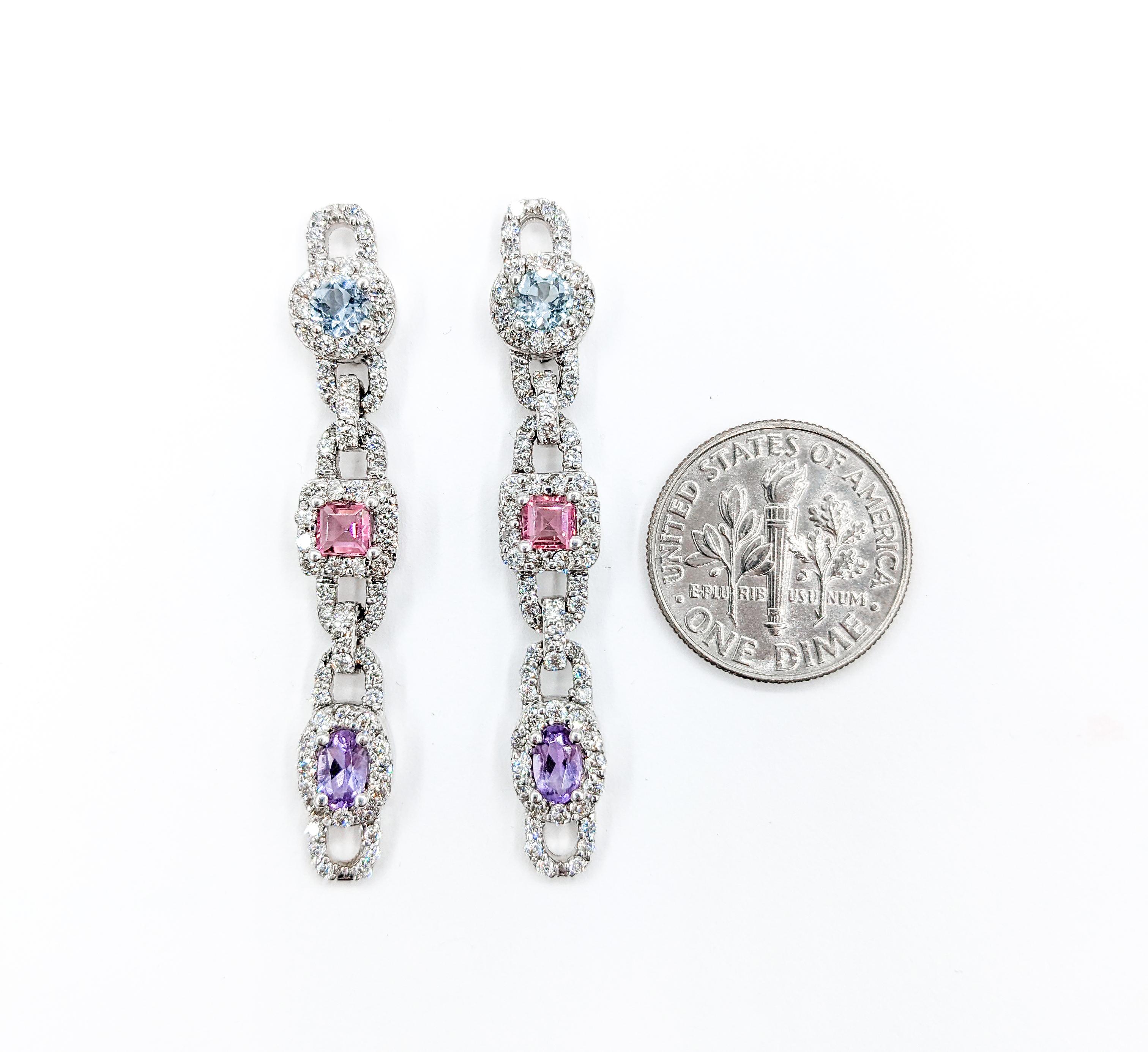 Multi-Gemstone Aquamarine, Pink Tourmaline, Amethyst & Diamond Drop Earrings in White Gold

These beautiful Multi Stone earrings feature Pastel Hues of Aquamarine, Pink Tourmaline & Amethyst Gemstones in 14K White Gold. The design is enhanced with