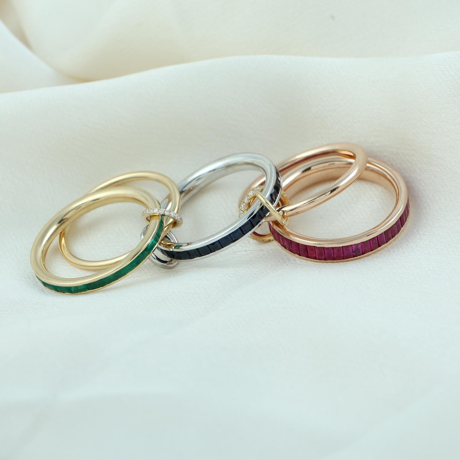 18KT:18,783g,D:0,25ct, Emer:1,37ct,Rubí:2,96ct,Sapp:2,34ct,