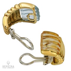 Orecchini a clip in oro giallo 18 carati con topazio blu e citrino