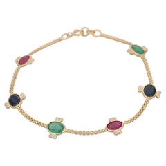 Bracciale a catena con più pietre preziose in oro giallo 18 carati