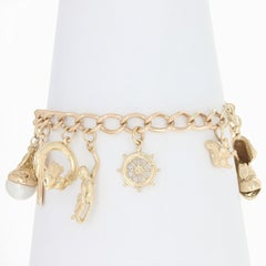Multi-Gemstone Charm Bracelet, 9 Karat Gold Rubies Cultured Pearl Enamel Glass