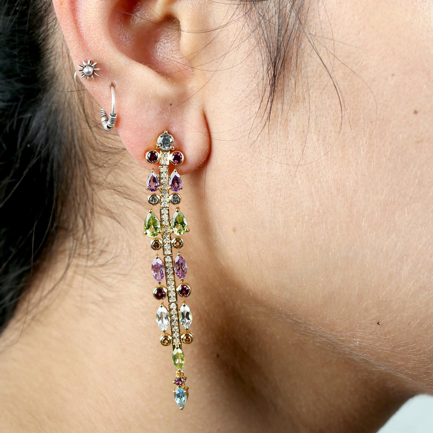 18KT:12.219g,
Diamant:0,52ct, 
Amethyst: 1,93ct,
Citrin:0,31ct,
Peridot:2,02ct,
Rhodlit:1.103
Topas:2,699ct

