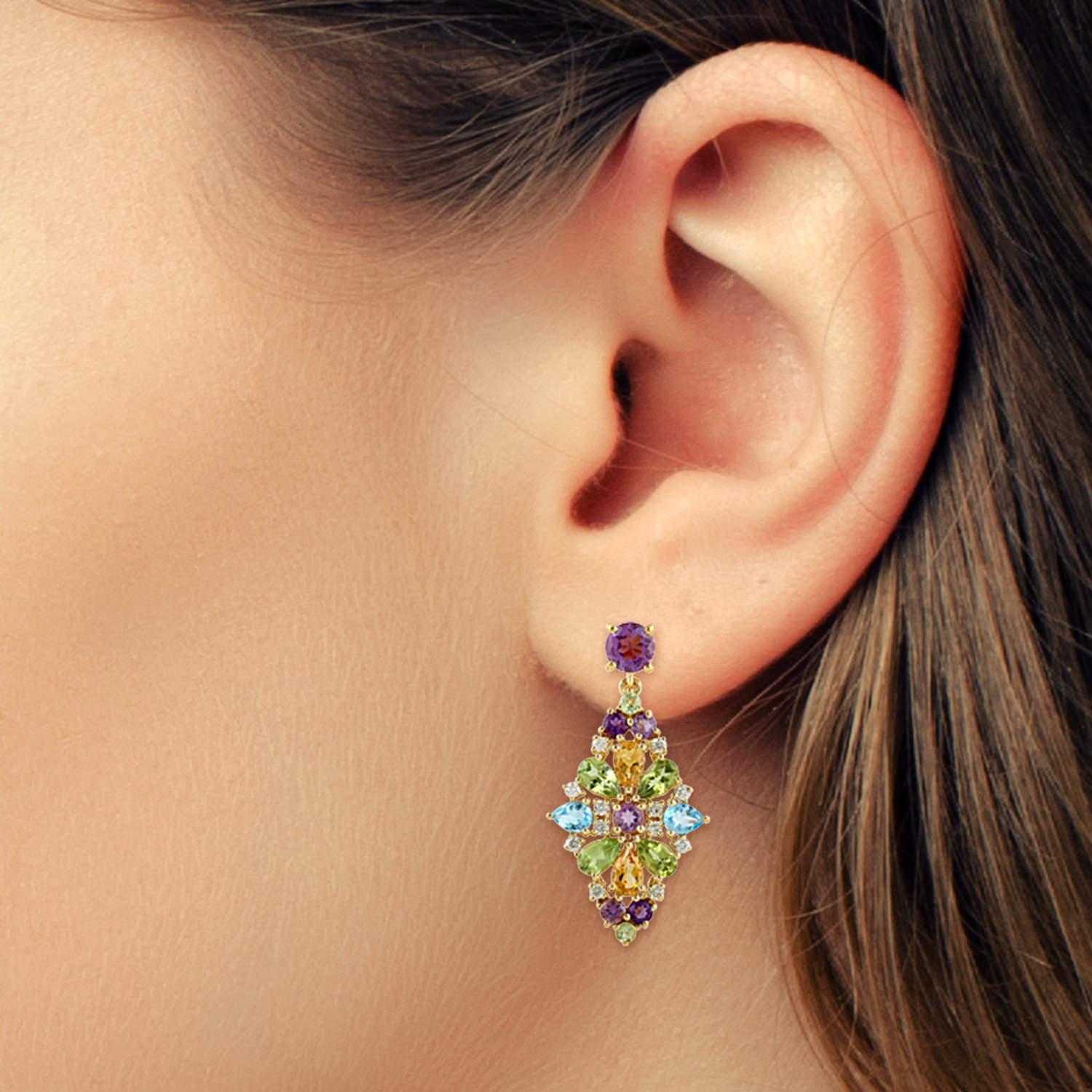 Cast from 18K gold, these multi gemstone earrings are true stunners.  It is hand set with 1.9 carat amethyst, .85 citrine, .80 peridot, .80 carats topaz and .36 carats of diamonds.

FOLLOW  MEGHNA JEWELS storefront to view the latest collection &