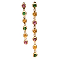 Orecchini pendenti asimmetrici in oro giallo 18 carati con diamanti e pietre preziose assortite