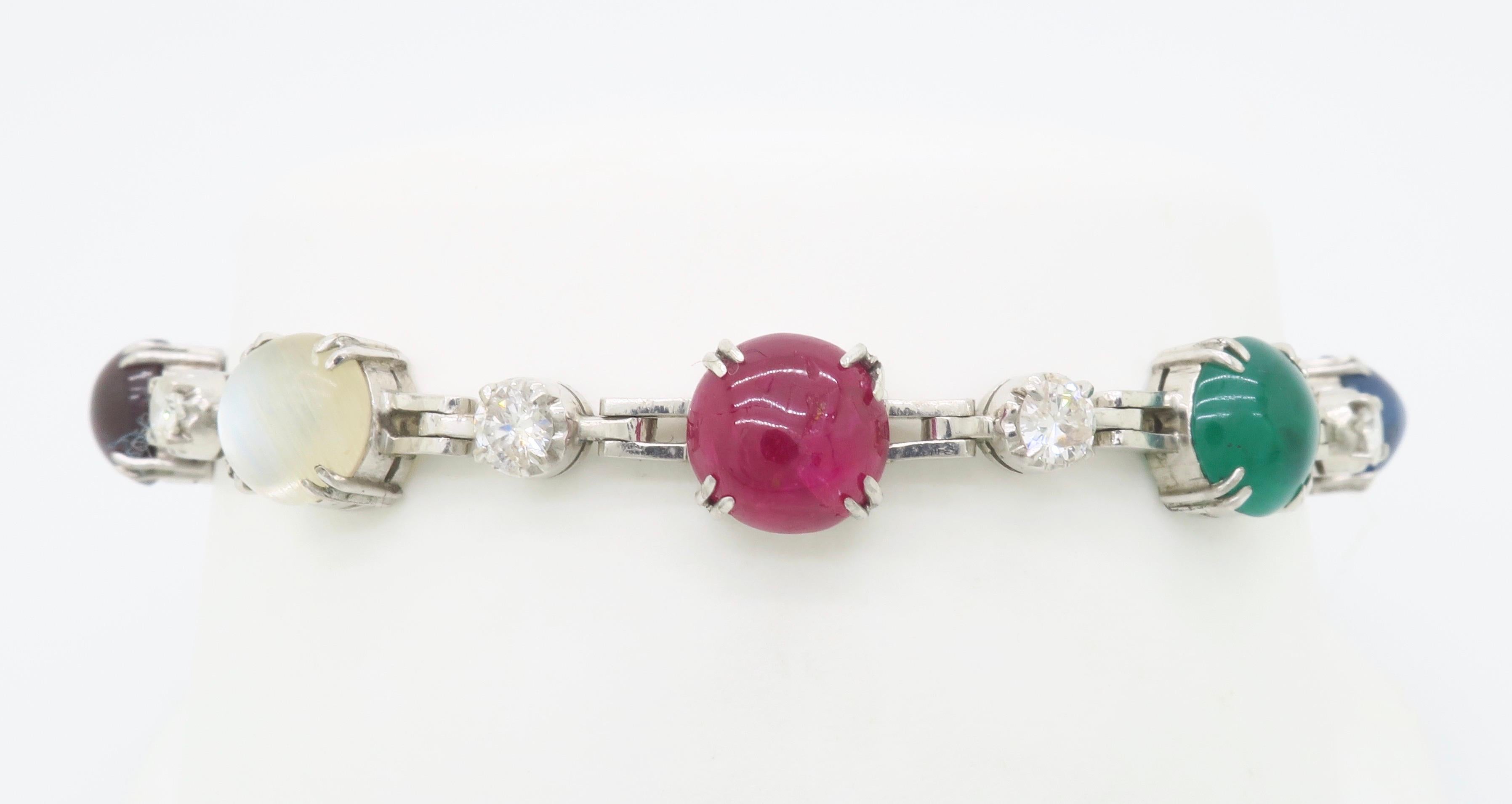 Custom made Gemstone & Diamond Station bracelet.

Gemstone: Diamond, Sapphire, Ruby, Emerald, Quartz
Diamond Carat Weight: Approximately 1.10ctw
Diamond Color: Average F-G
Diamond Clarity: Average VS-SI
Metal: 68% Silver, 14% Gold, 12% Palladium, 3%