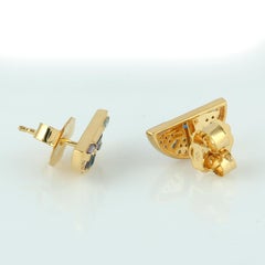 Orecchini con borchie e diamanti in oro giallo 18 ct.