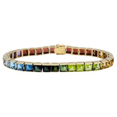 Mehrsteiniges Ombre-Tennisarmband aus 14 Karat Gelbgold mit Prinzessinnenschliff und Regenbogenschliff