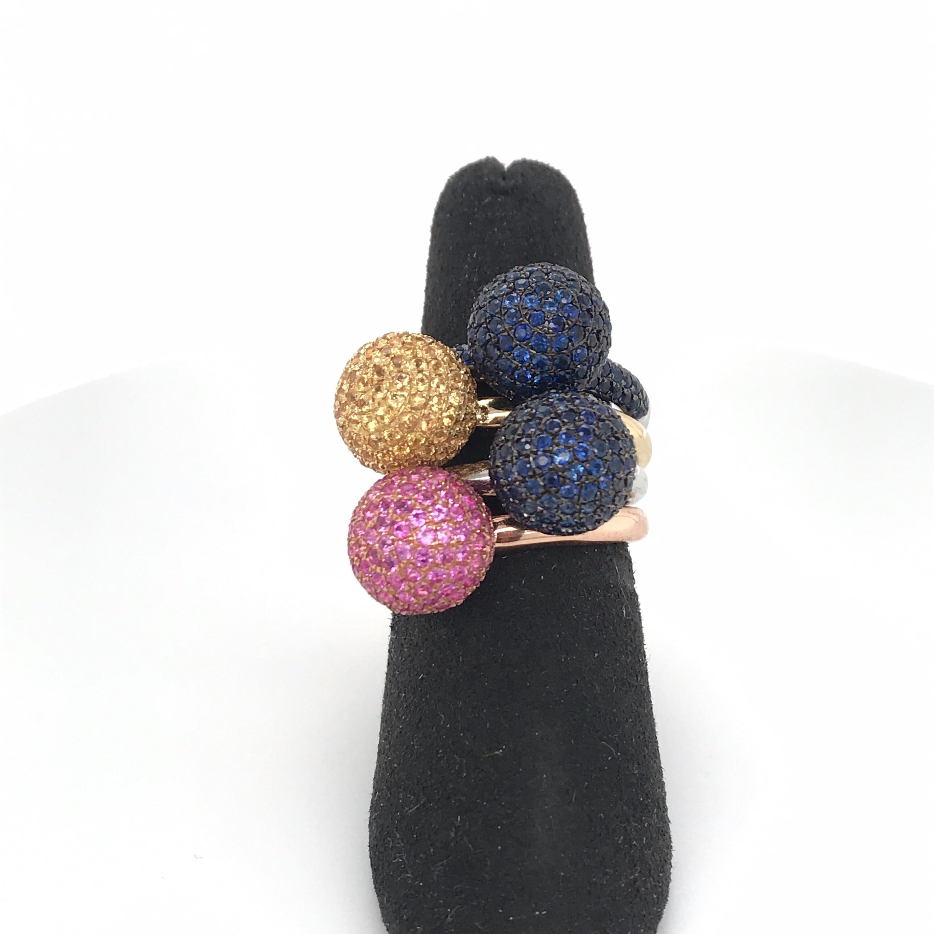A set of 18k white, yellow and rose gold ball rings featuring blue, pink, and yellow sapphires. A fun set to own. Can be sold separately.
French Hallmarks 