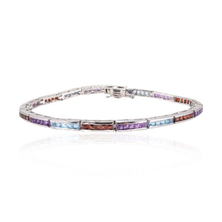 Multi Gemstone Sleek Tennis Bracelet Gift for Grandma in sterling silver showcases endlessly sparkling natural multi gemstone, weighing 5.48 carat. It measures 7 inches long in length. 
Multi Gemstone stimulate concentration and reduces stress.