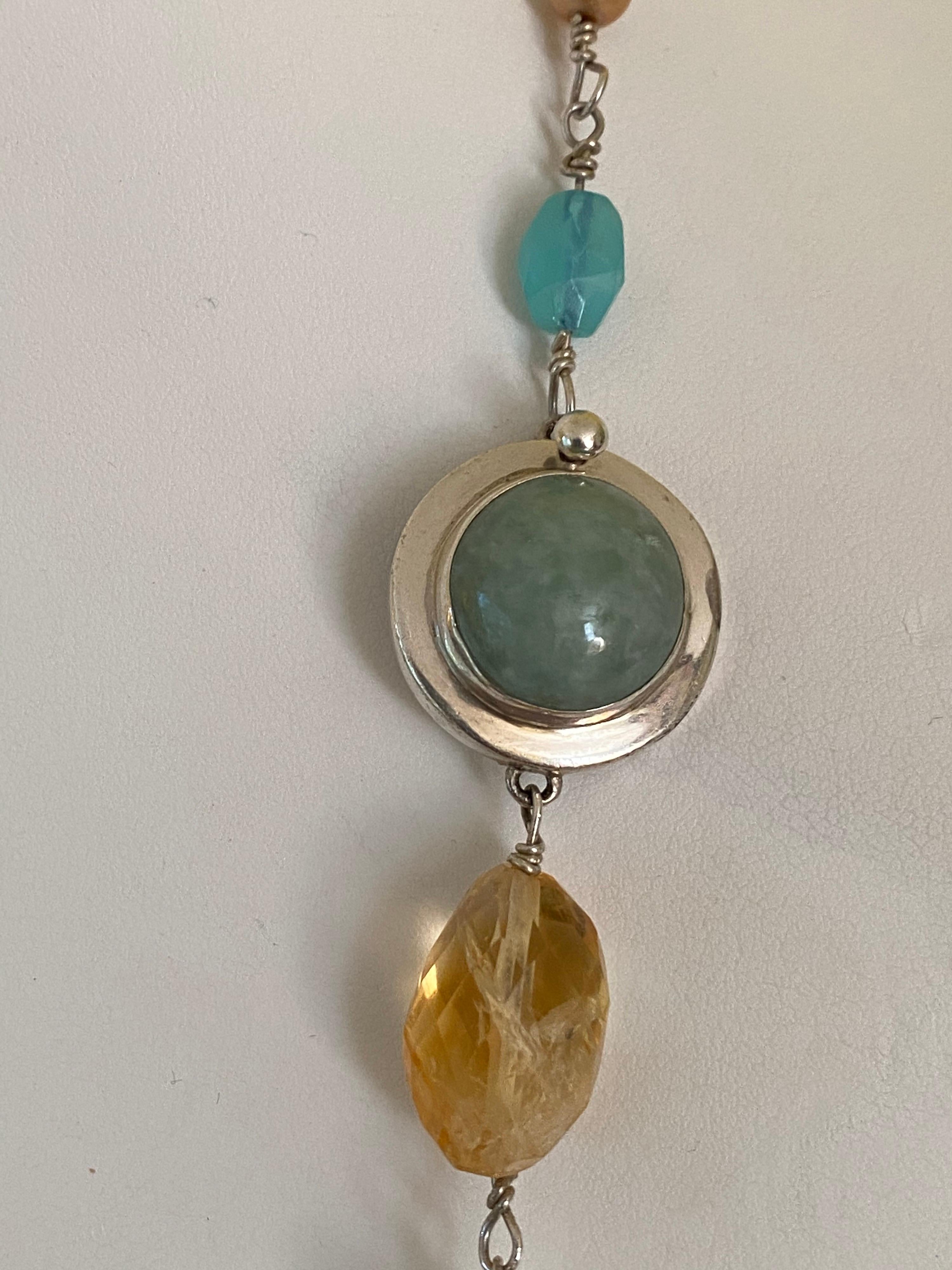 If you love color and different gemstones this is the necklace for you. So pretty and goes with so many outfits because it has so many colors in it. Hand wire wrapped to give a Bohemian Chic look and feel. Freshwater Cultured Pearls (white, yellow,