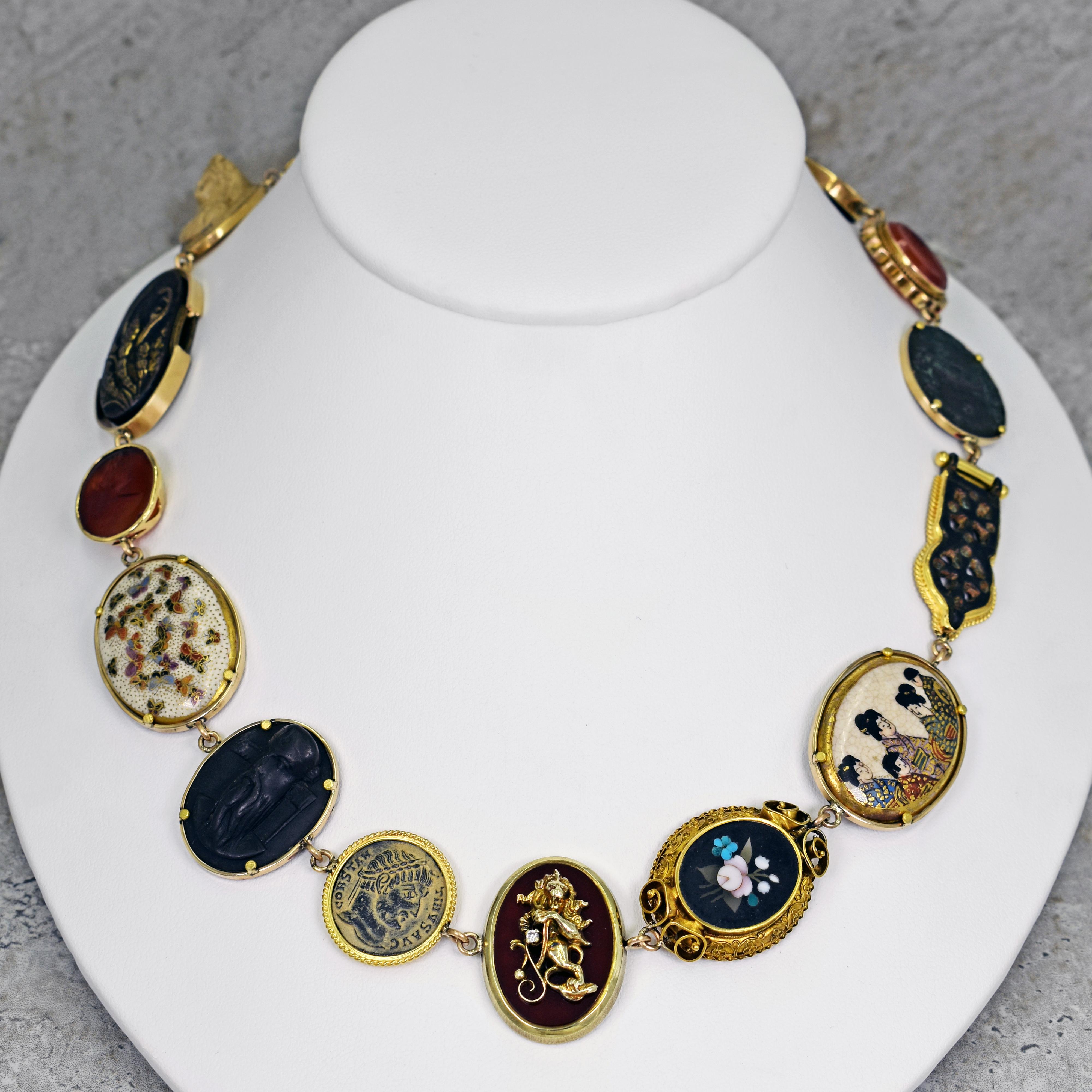 One-of-a-kind Vicki Orr 14k yellow gold Bohemian necklace with a variety of gemstones, vintage and antique jewelry components and an ancient coin. Necklace has 15 unique pieces, featuring Byzantine-era Bronze Roman Cross, Bone Cameo, Antique Samurai