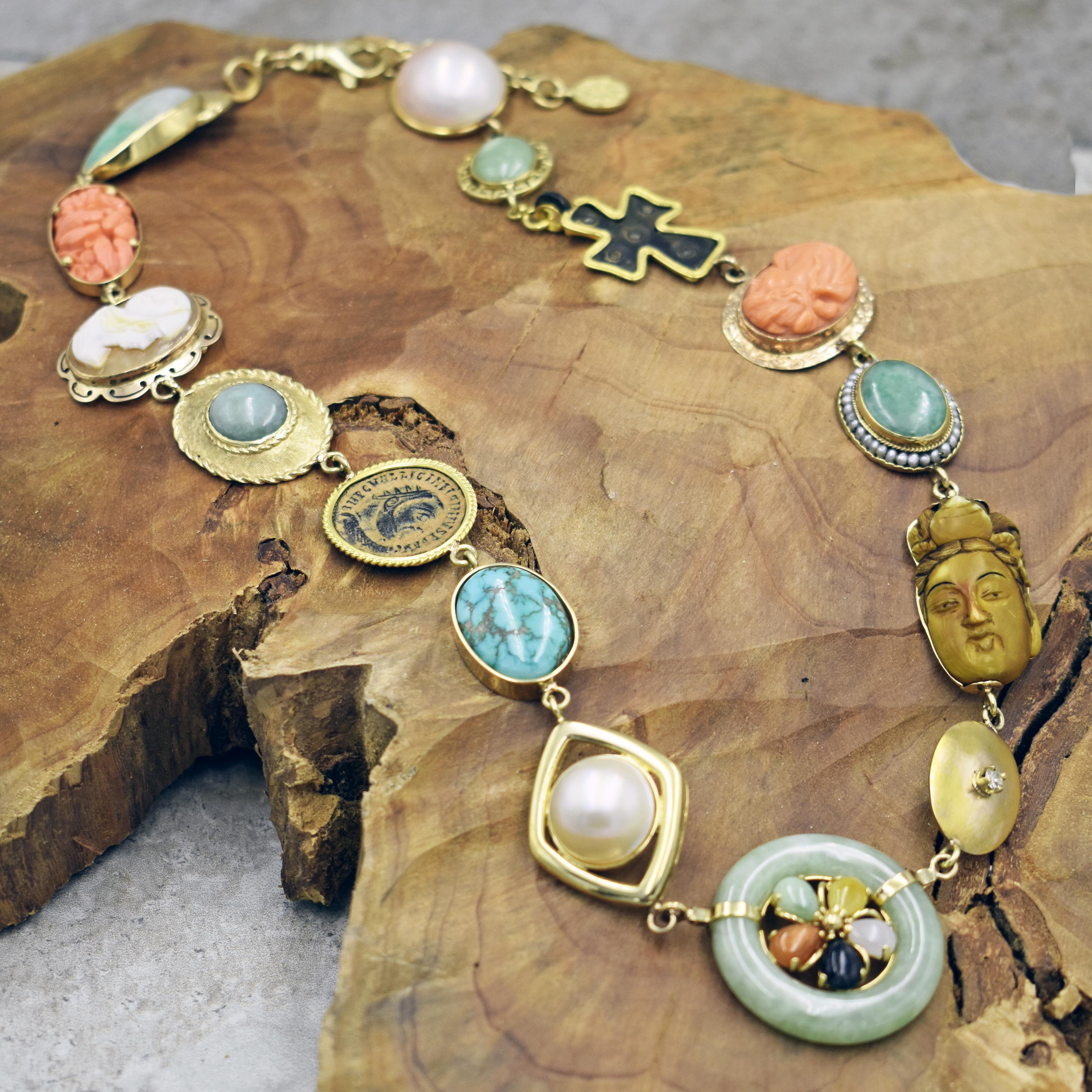 One-of-a-kind Vicki Orr Designs 14k yellow gold Bohemian necklace with a variety of gemstones, vintage, antique and ancient jewelry components.  Necklace has 15 unique pieces, featuring green Jade, carved Coral, Shell Cameo, Ancient Roman Bronze