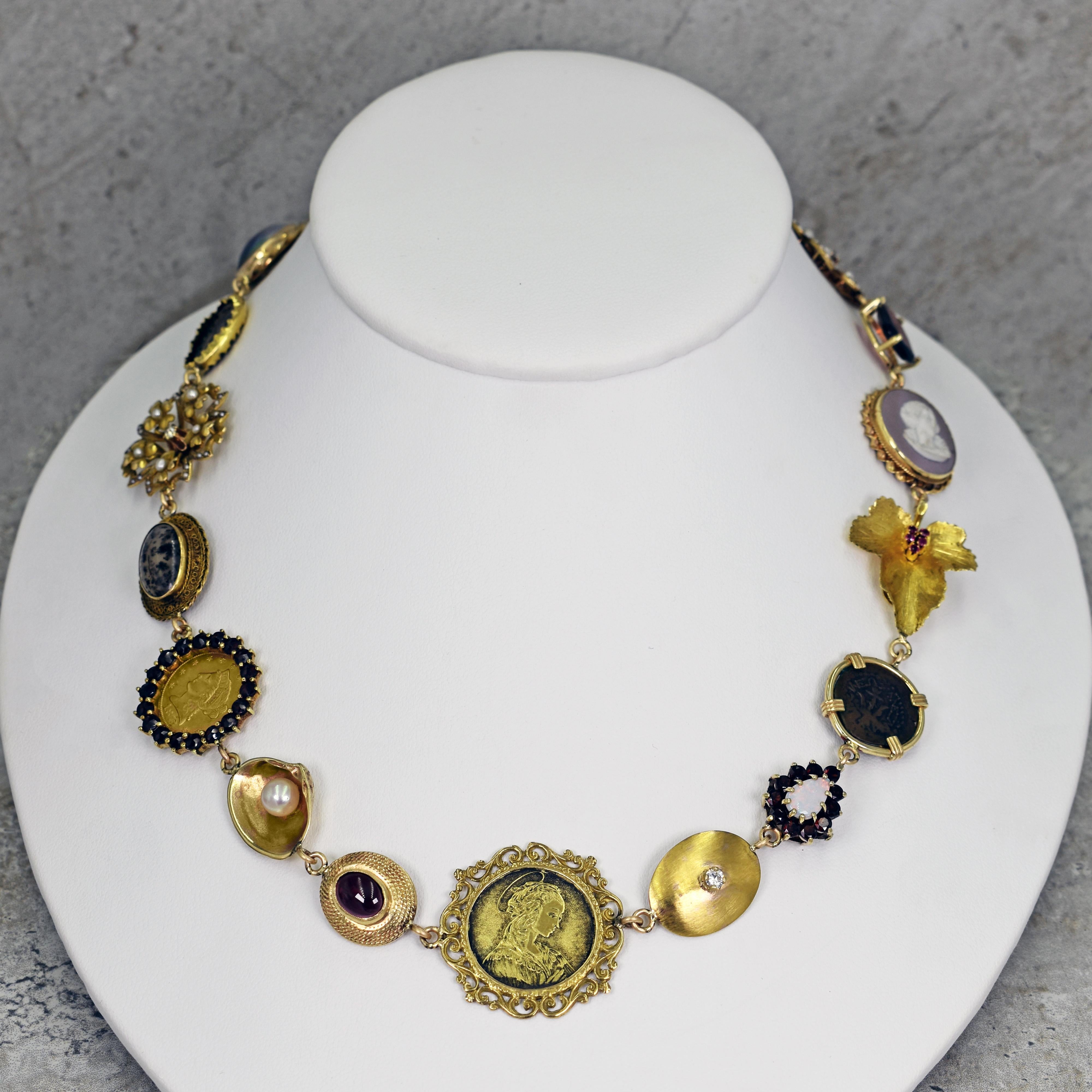 One-of-a-kind Vicki Orr 14k yellow gold Bohemian necklace with a variety of gemstones, vintage and antique jewelry components and an ancient coin. Necklace has 18 unique pieces, featuring Garnet, Bloodstone, Tahitian Pearl, Australian Matrix Opal,