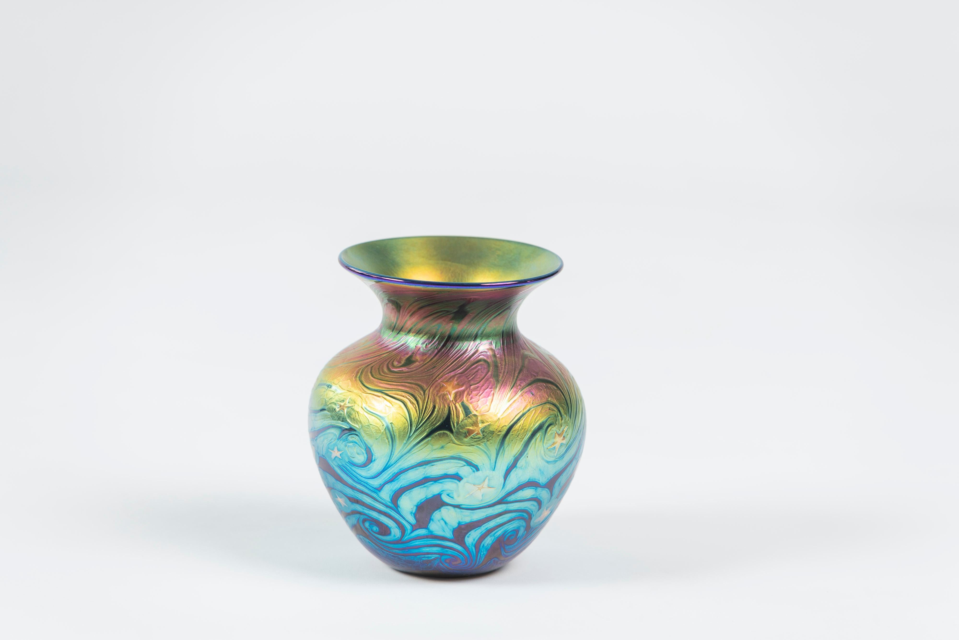 Multi-iridescent swirl art glass vase, Lundberg Studios of California, signed 2001. Beautiful finishes and in collectible condition.