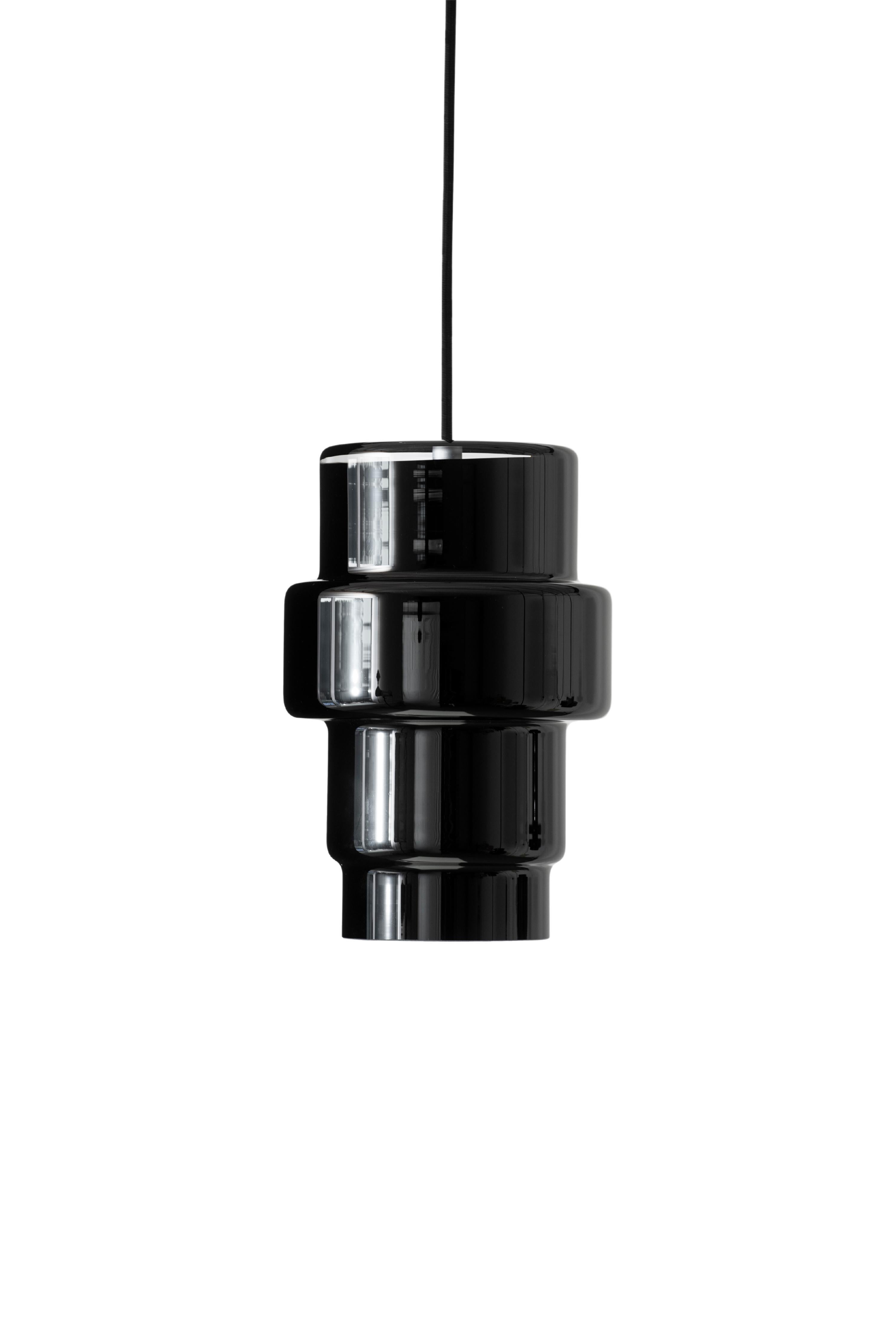 'Multi L' glass pendant by Jokinen and Konu for Innolux. The award winning MULTI glass collection is based on an artistically innovative form of modular glass blowing mold developed by the internationally acclaimed Finnish design team of Jukka