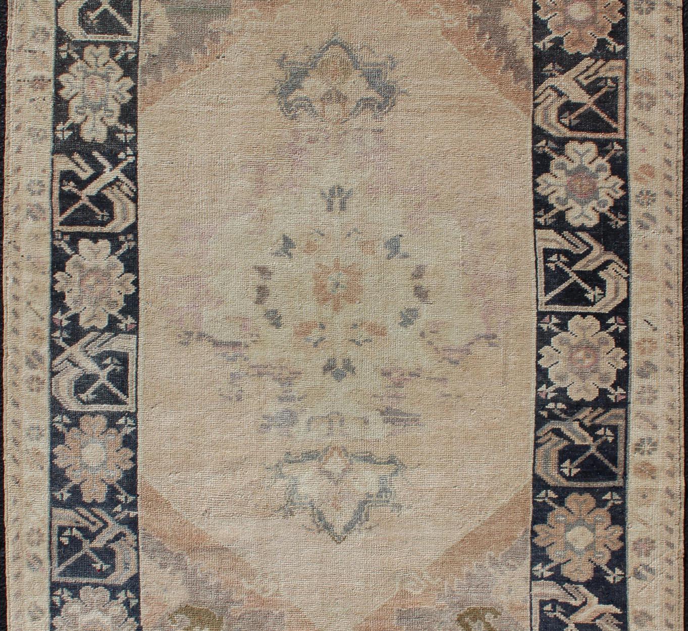 Hand-Knotted Multi-Layered Medallion Vintage Turkish Oushak Rug in Cream and Midnight Blue For Sale