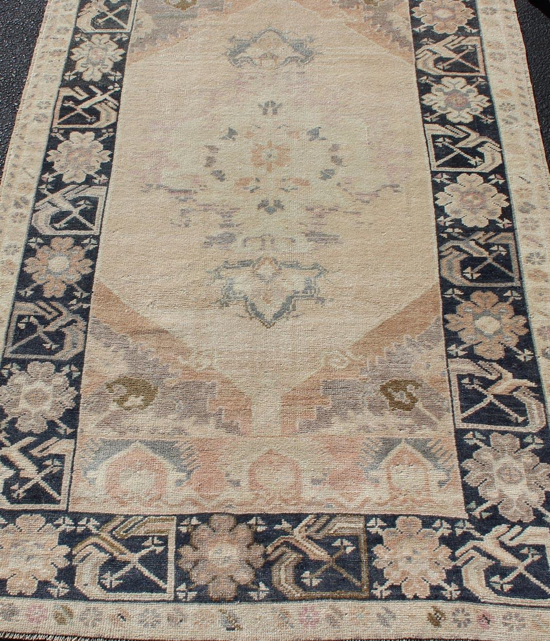 Wool Multi-Layered Medallion Vintage Turkish Oushak Rug in Cream and Midnight Blue For Sale
