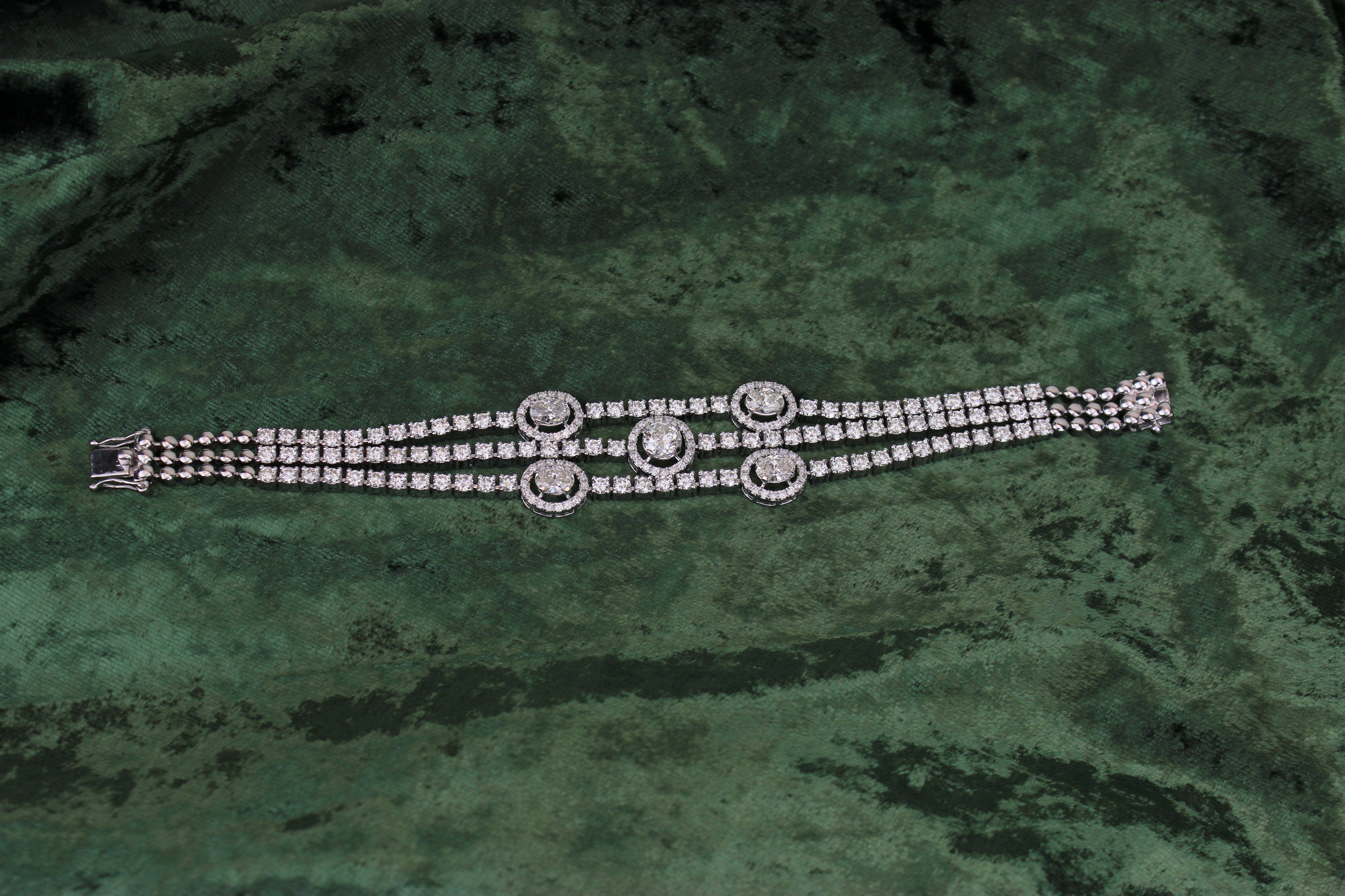 Features oval & round cut diamonds. Made with the highest quality natural diamonds on a 100% guaranteed 18k solid gold. 

THE STONES-
This bracelet consists of  oval & round solitaire shaped natural diamonds (average size 65 pointers) weighing 3.24