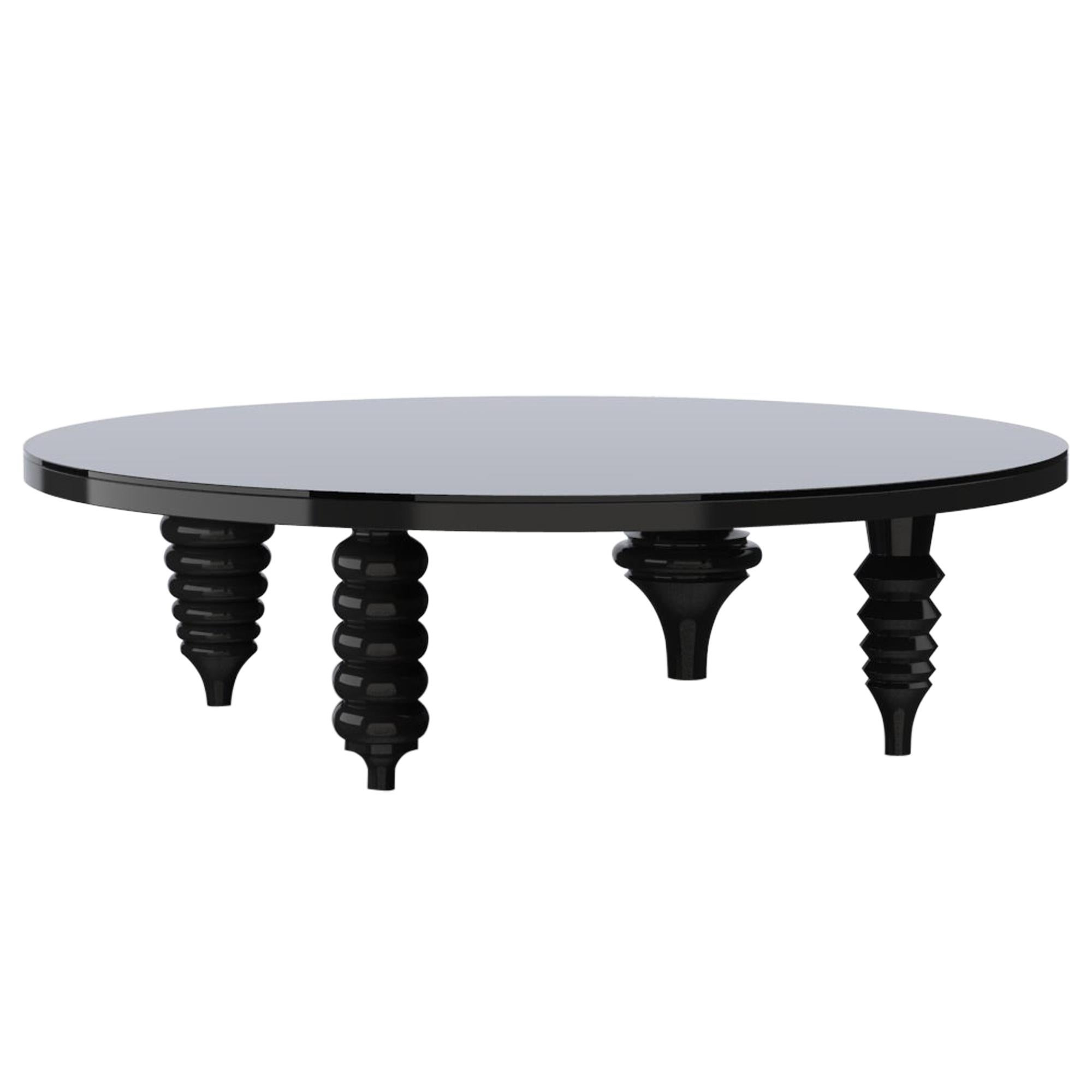 Table basse contemporaine multi-pieds finition laquée noire brillante, plateau en verre