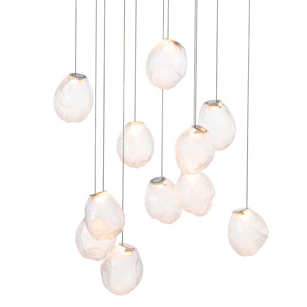 A multi pendant light suspension from 73 serie of BOCCI
Discover the 73 Serie Collection of multi-light suspensions from BOCCI and designer Omer Arbel.  

73 results from blowing liquid glass into a folded and highly heat-resistant ceramic fabric