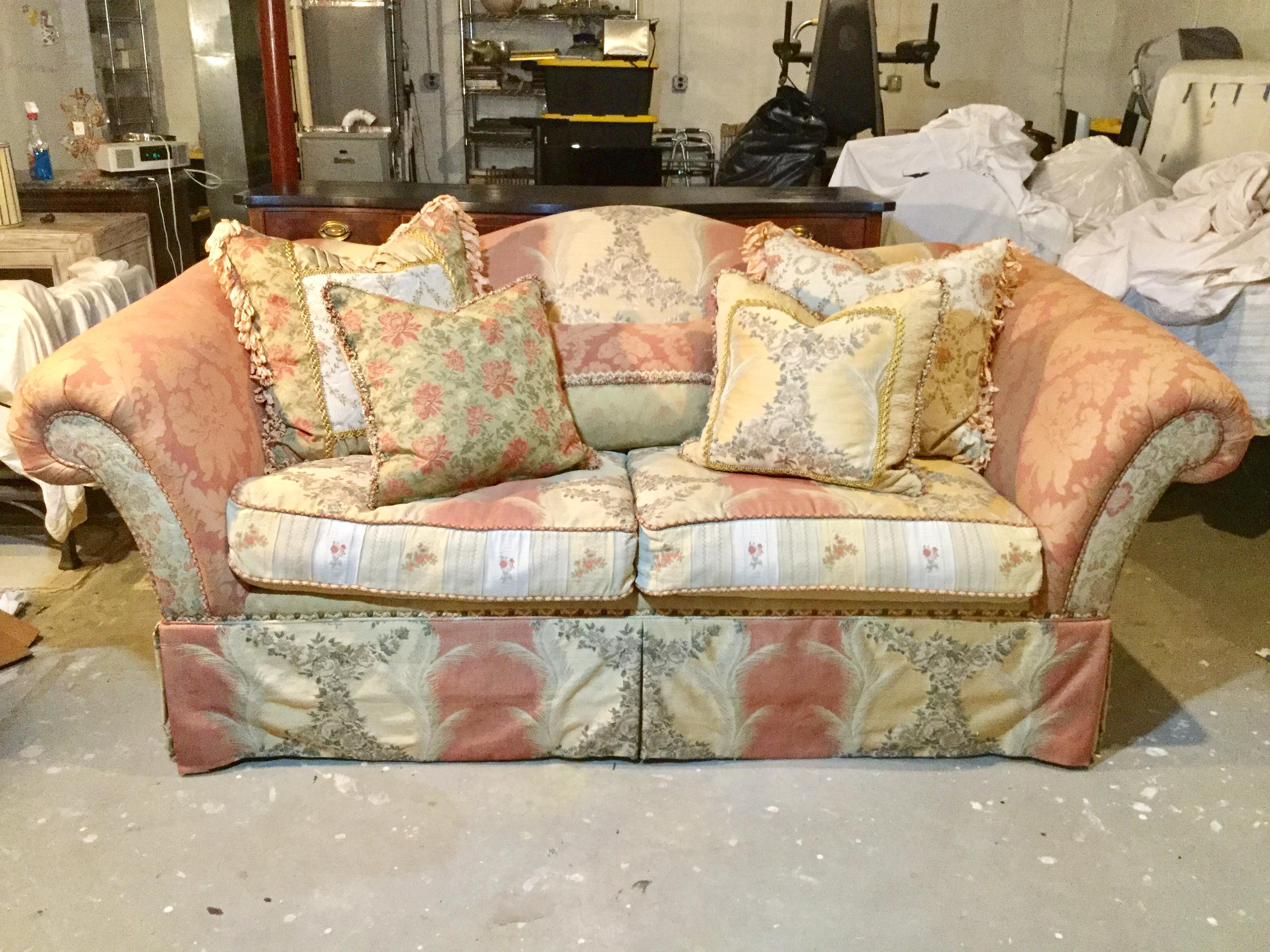 From the Victoria collection of Domain, this couch is super comfy with lots of down-pillows and deep seats. This piece features a multitude of coordinating fabrics for a rich, designer effect. Rounded arms and a high back assure searing comfort.