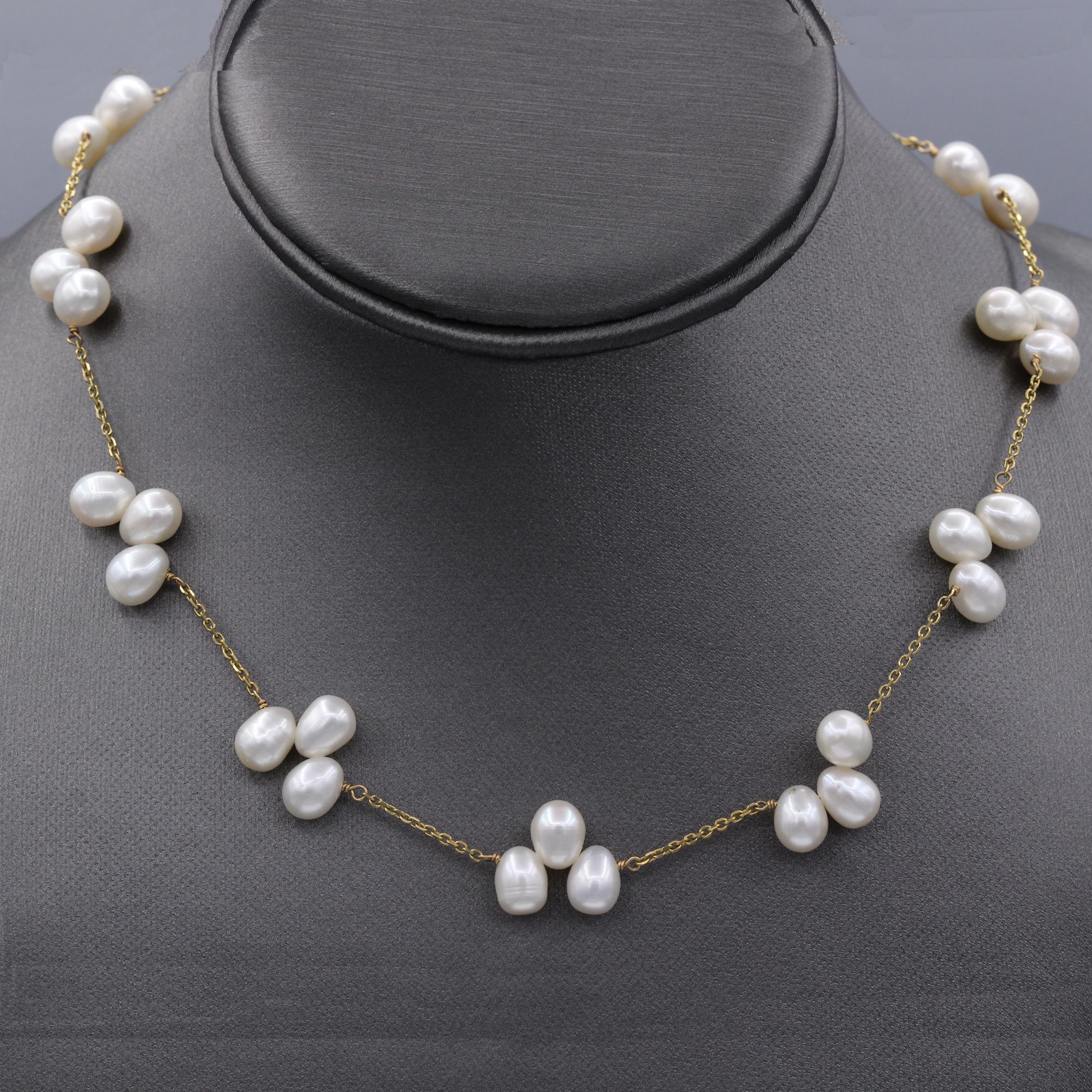 Multi Pearl Necklace – Elegant Wire Style 
14k Yellow Gold  
Length 16.5’ Inch 
Fresh Water White Pearls approx. 6.0 mm
Nice Luster Pearls 
Total Weight 20.0 grams
Lobster Lock
