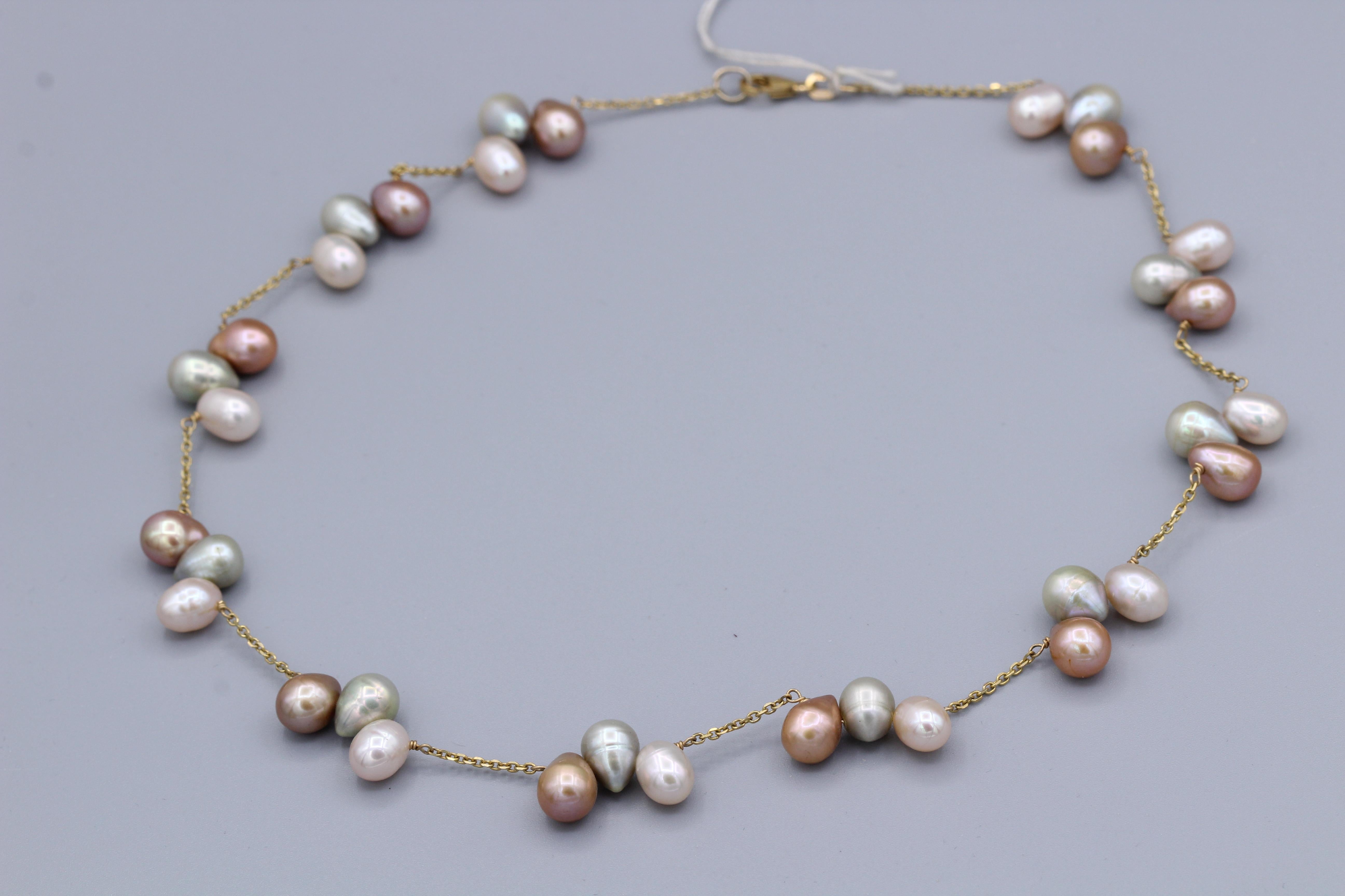 Elegante Perlenkette mit mehrfarbigen Perlen
14k Gelbgold Kette Draht Stil
Länge  16.5 ' Zoll
Süßwasser multi Farben ca. 6,0 mm
Hummerschloss 
Gesamtgewicht 22,0 Gramm

