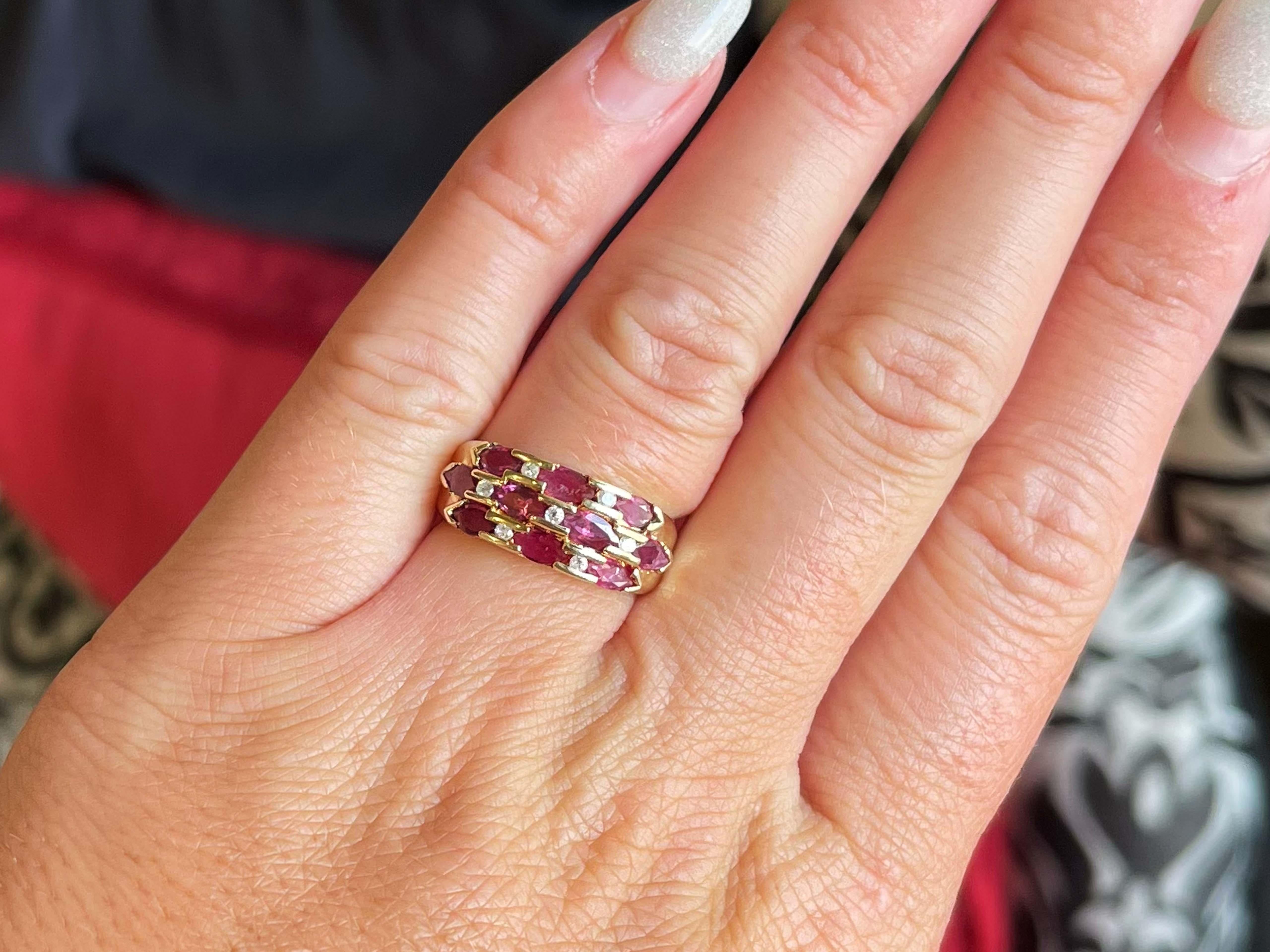 Item Specifications:

Metal: 14K Yellow Gold
Ring Size: 5.5

Total Weight: 3.9 Grams

Gemstone Specifications:

Gemstones: 10 red rubies

Ruby Carat Weight: ~1.00 carats

Diamond Carat Weight: 0.07 carats

Diamond Count: 7

Diamond Color: