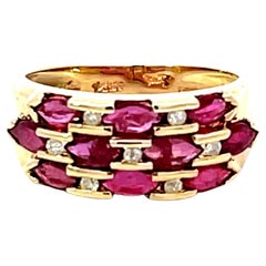 Bague multi-anneaux en or jaune 14 carats avec rubis rouge et diamants