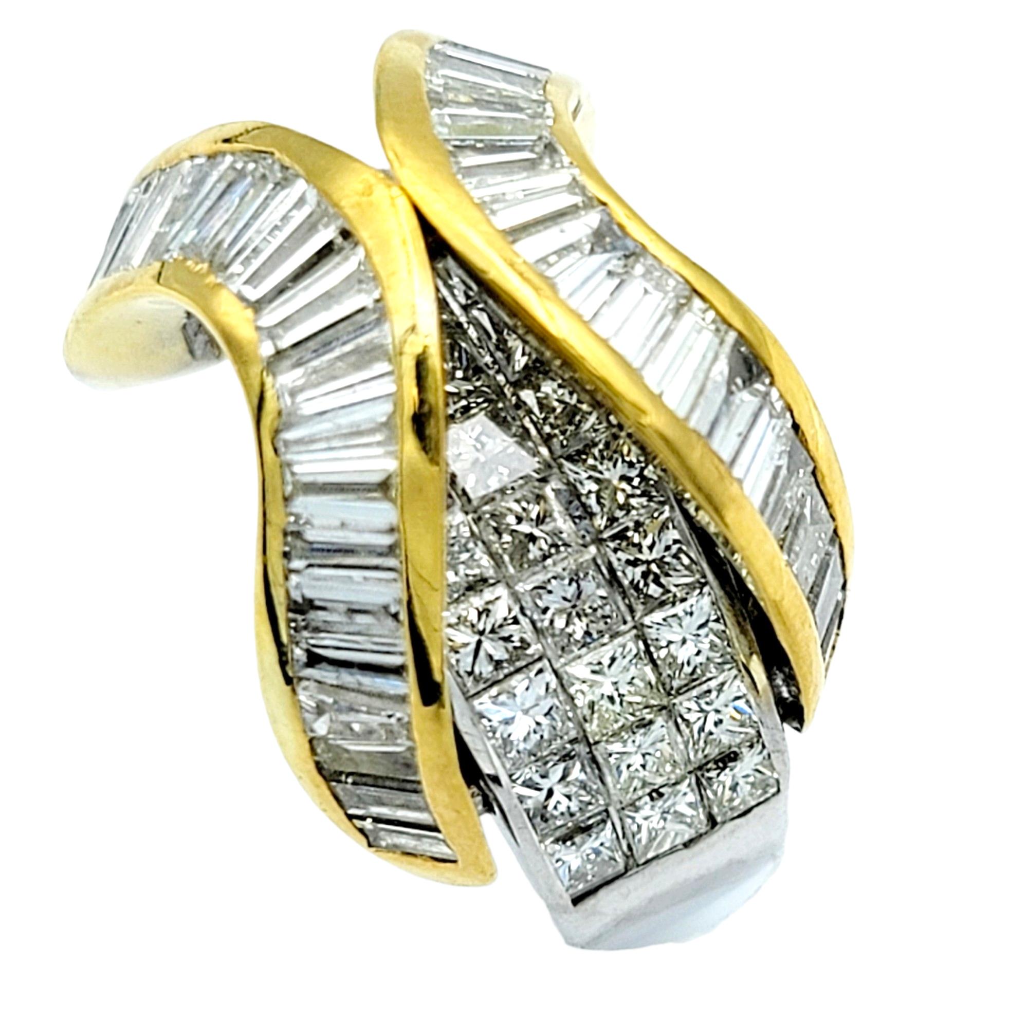 Ring size: 5

Absolutely stunning contemporary diamond cocktail ring. This exquisite creation seamlessly marries the allure of princess cut and baguette cut diamonds, as well as luxurious white and yellow golds, resulting in a captivating
