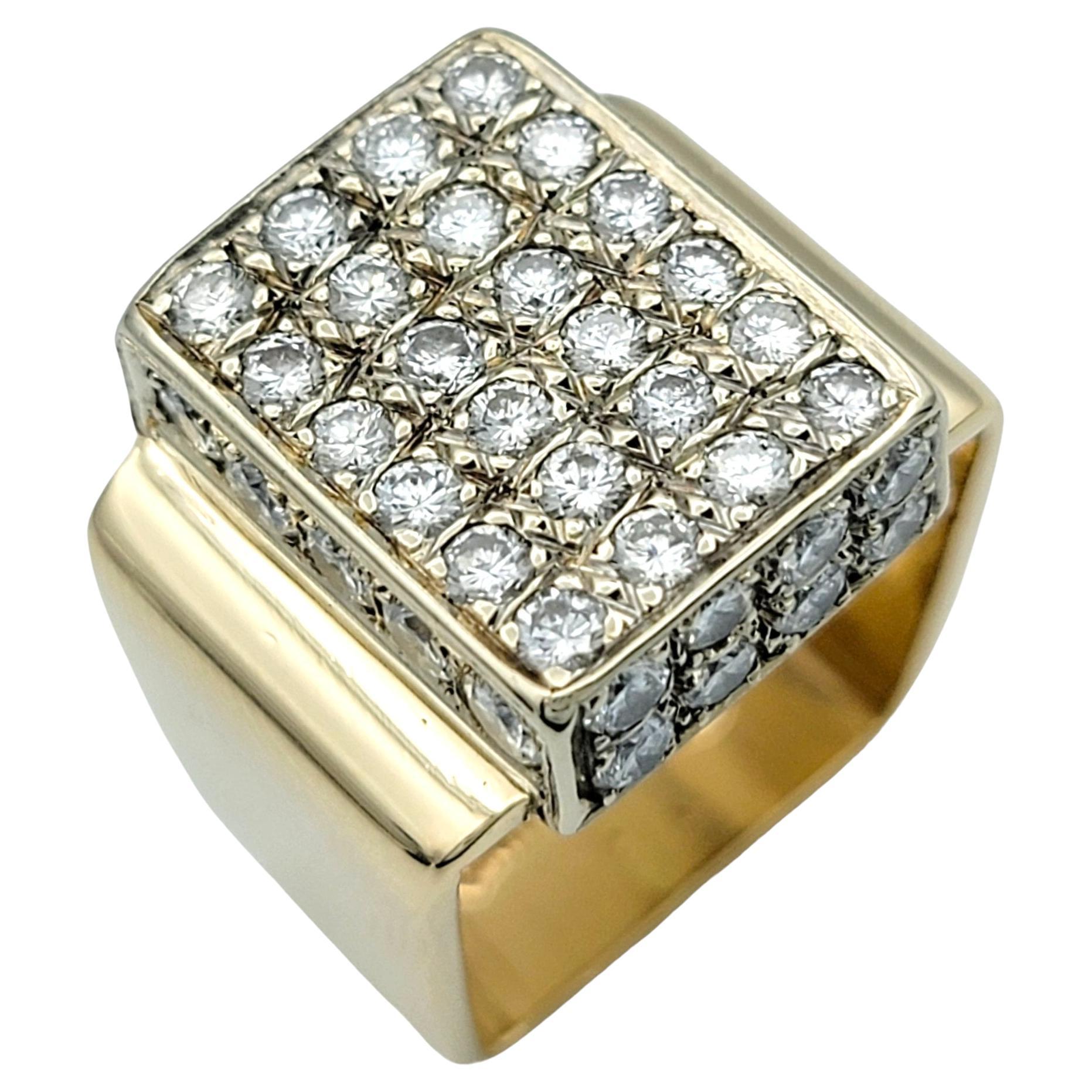*Ring sizer measures this piece at a size 4.75, but it will comfortably fit a size 5.5 due to its squared shape. 

This diamond geometric cluster ring is a stunning piece set in 14 karat yellow gold, featuring a band with a unique squared design.