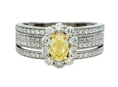 Multi-Row Pavé Diamond Band Ring with Oval Cut Fancy Yellow Diamond in 14K Gold