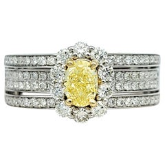 Multi-Row Pavé Diamond Band Ring with Oval Cut Fancy Yellow Diamond in 14K Gold