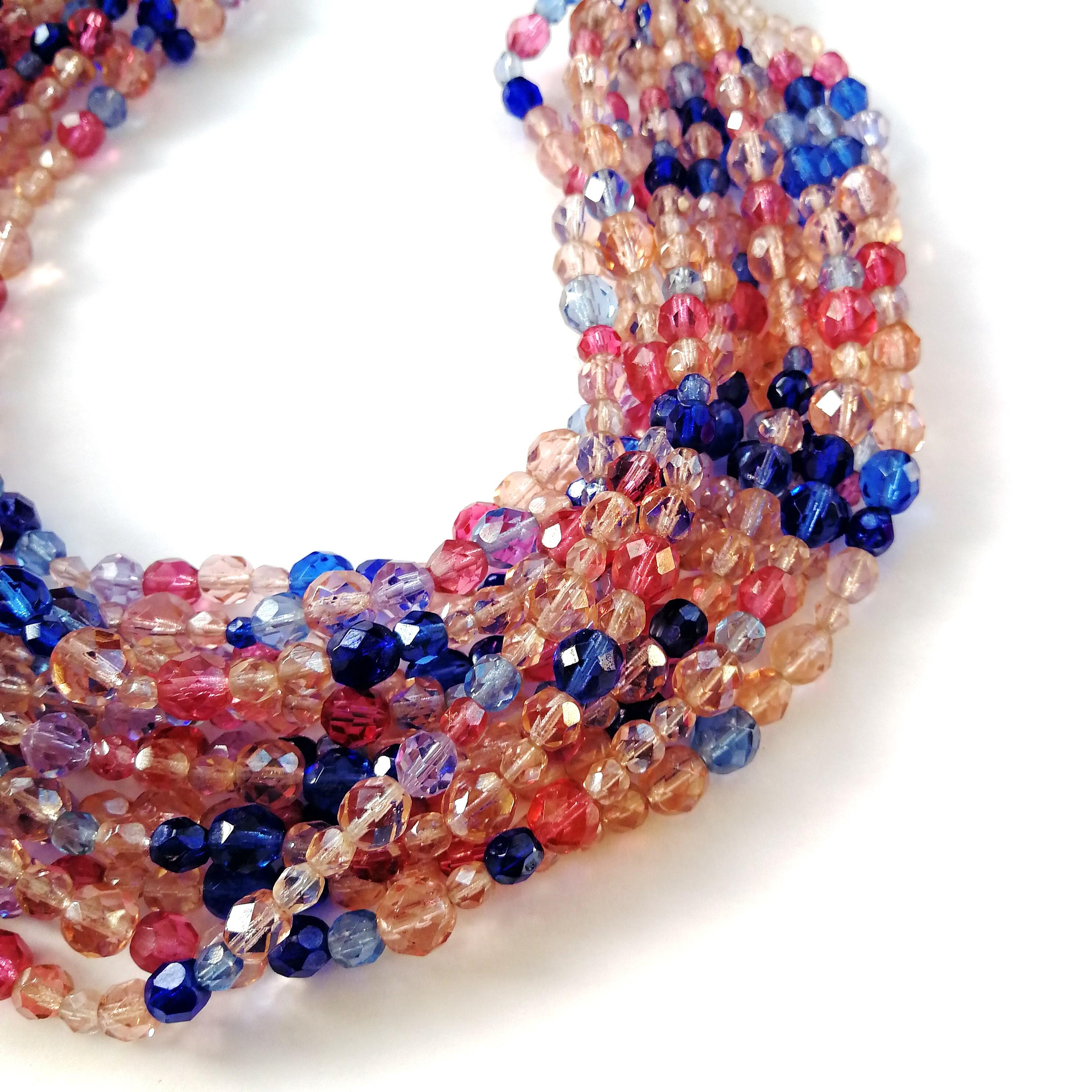 A beautiful multi row, multi coloured half crystal faceted beads in soft pink, respberry, mid blue and Royal blue, fresh and joyful.  Consisting of 13 rows in total, it is a sumptuous addition to any collection or wardrobe, equally matched for