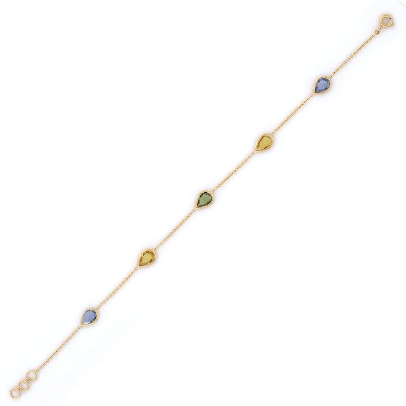 This Minimalist Pear Cut Sapphire Chain Bracelet in 18K Gold showcases 5 endlessly sparkling natural multi sapphire, weighing 2.98 carats. It measures 7.25 inches long in length. 
Sapphire stimulates concentration and reduces stress.
Designed with