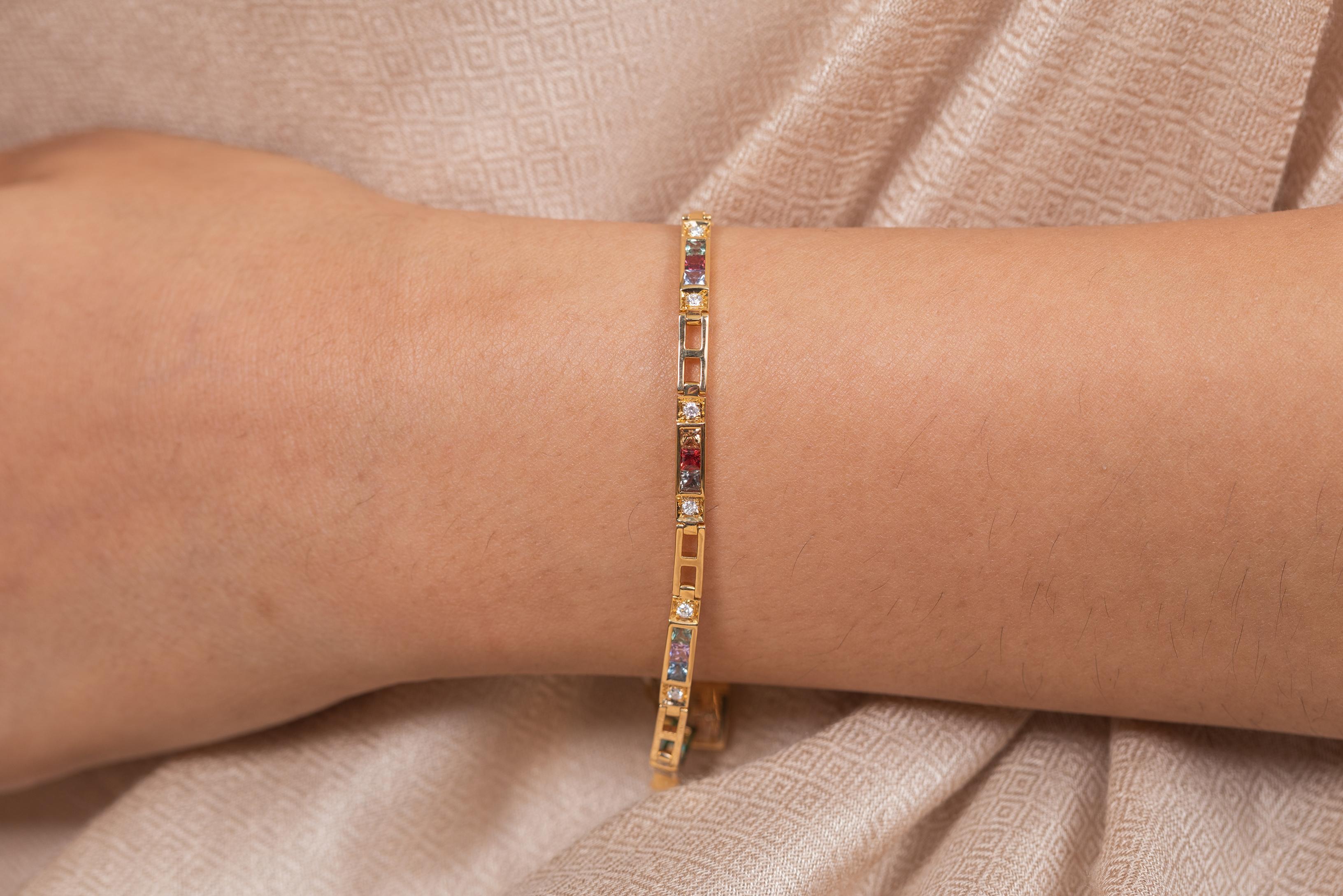 The wearing of charms may have begun as a form of amulet or talisman to ward off evil spirits or bad luck.
This multi sapphire bracelet has a square cut gemstone and diamonds in 18K Gold. A perfect piece of jewelry to adorn your jewelry