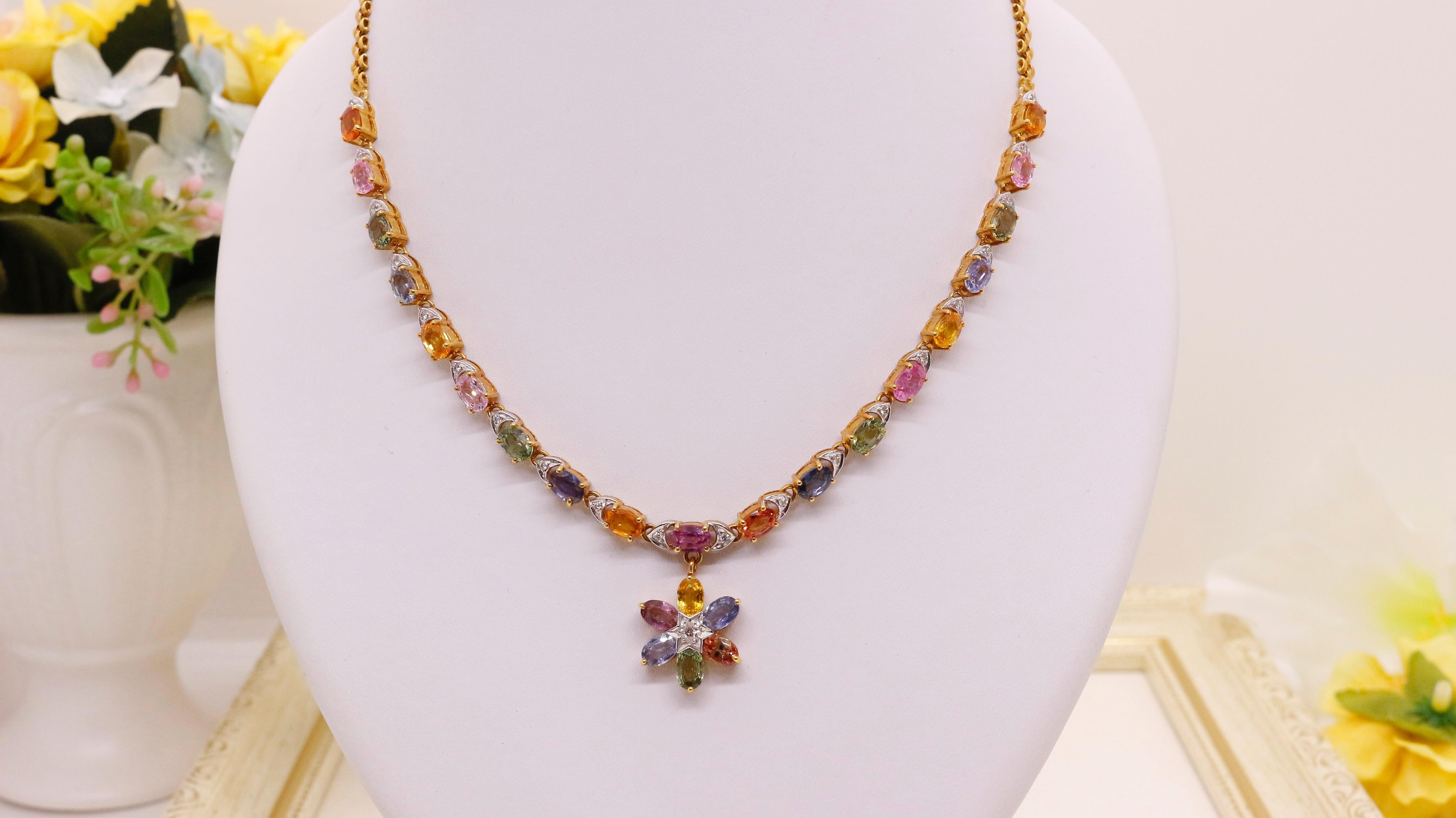 Introducing our exquisite multi-sapphire necklace! This stunning piece of jewelry is a true showstopper, featuring a collection of faceted sapphires in various vibrant colors. From brilliant blues to captivating pinks, yellows, and greens, each
