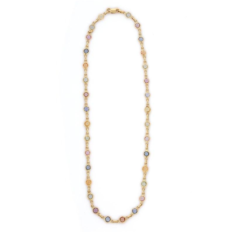 Collier multi-saphirs en or 18 carats constellé de saphirs de taille ronde.
Accessoirisez votre look avec cet élégant collier perlé multi-saphirs. Ce superbe bijou rehausse instantanément un look décontracté ou une tenue habillée. Confortable et