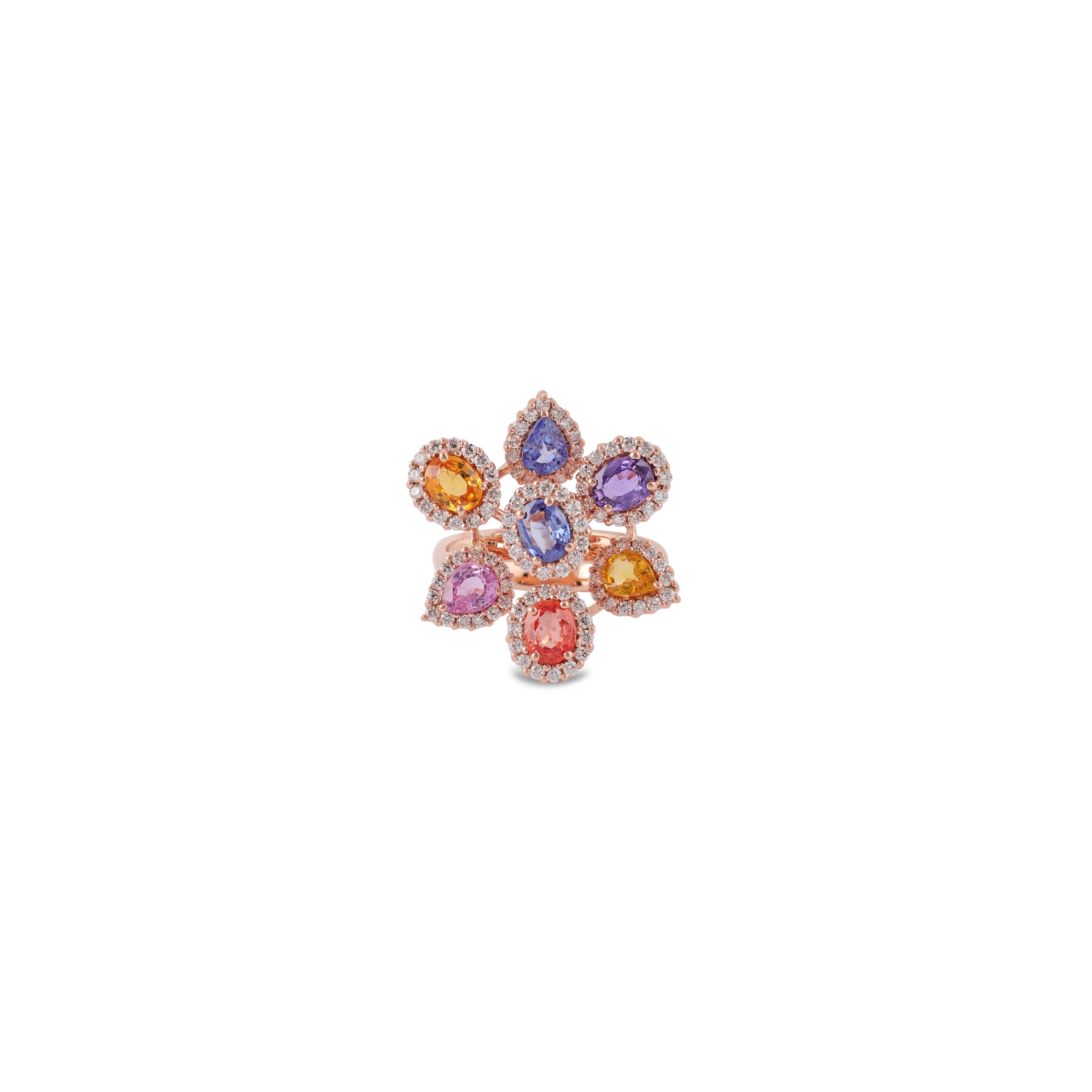 This is a designer floral pattern ring studded in 18k rose gold with 7 pieces of Multi Sapphire weight 2.91 carat with round shaped diamond weight 0.70 carat, this entire ring is studded in 18k rose gold weight 6.36 grams, in this ring size can be