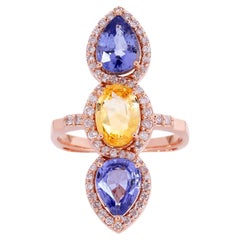 Multi-Sapphire Triple Stone Ring in 18kt Gold with Diamond Halo