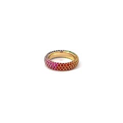 Anello esclusivo con fascia di zaffiri multipli e diamanti in oro giallo 18 carati