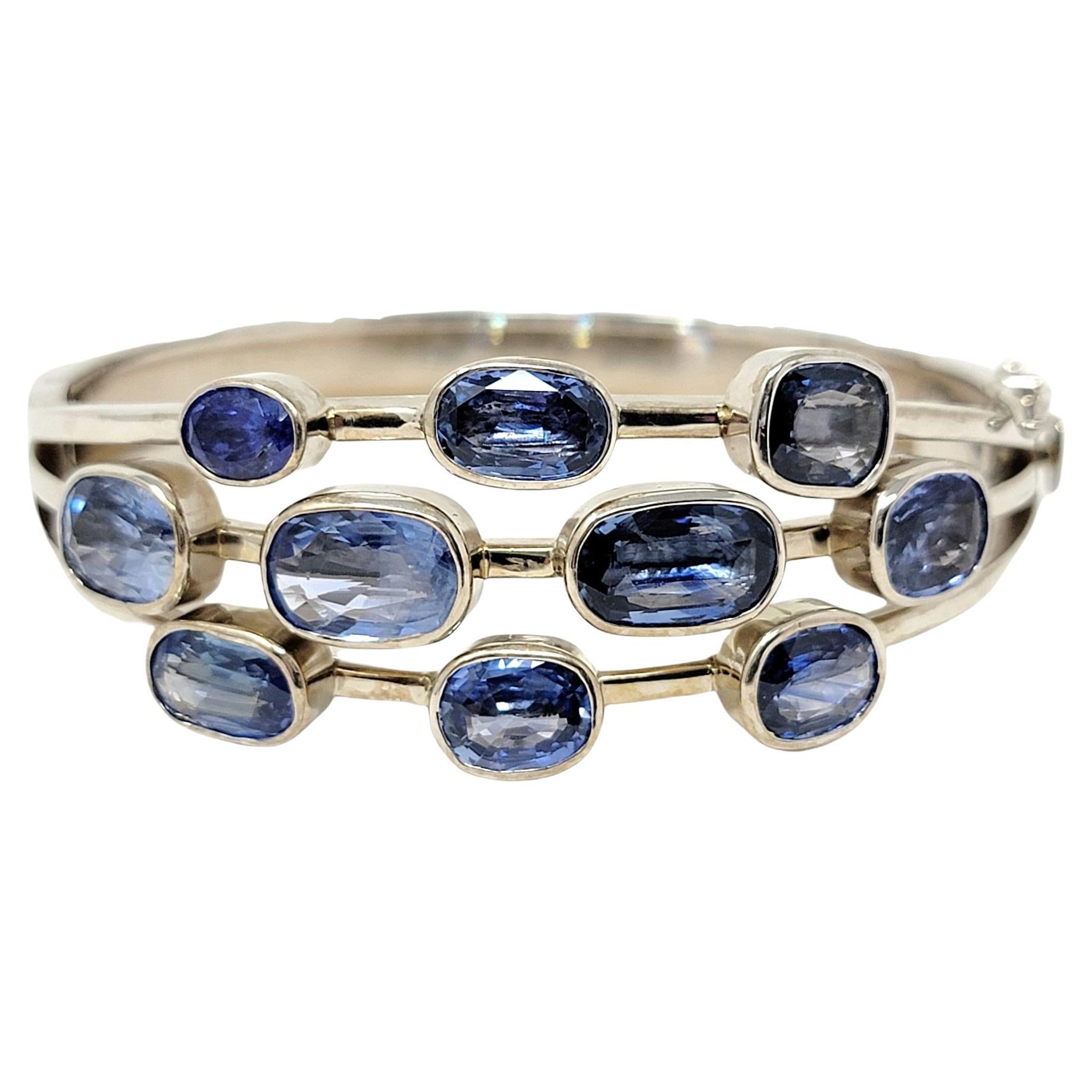 Multi Shades of Blue Sapphire and Tanzanite 14 Karat White Gold Bangle Bracelet  For Sale
