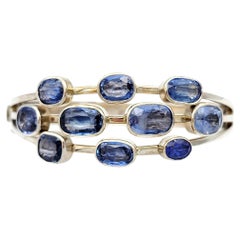 Multi Row Blue Sapphire and Tanzanite Bangle Bracelet 14 Karat White Gold