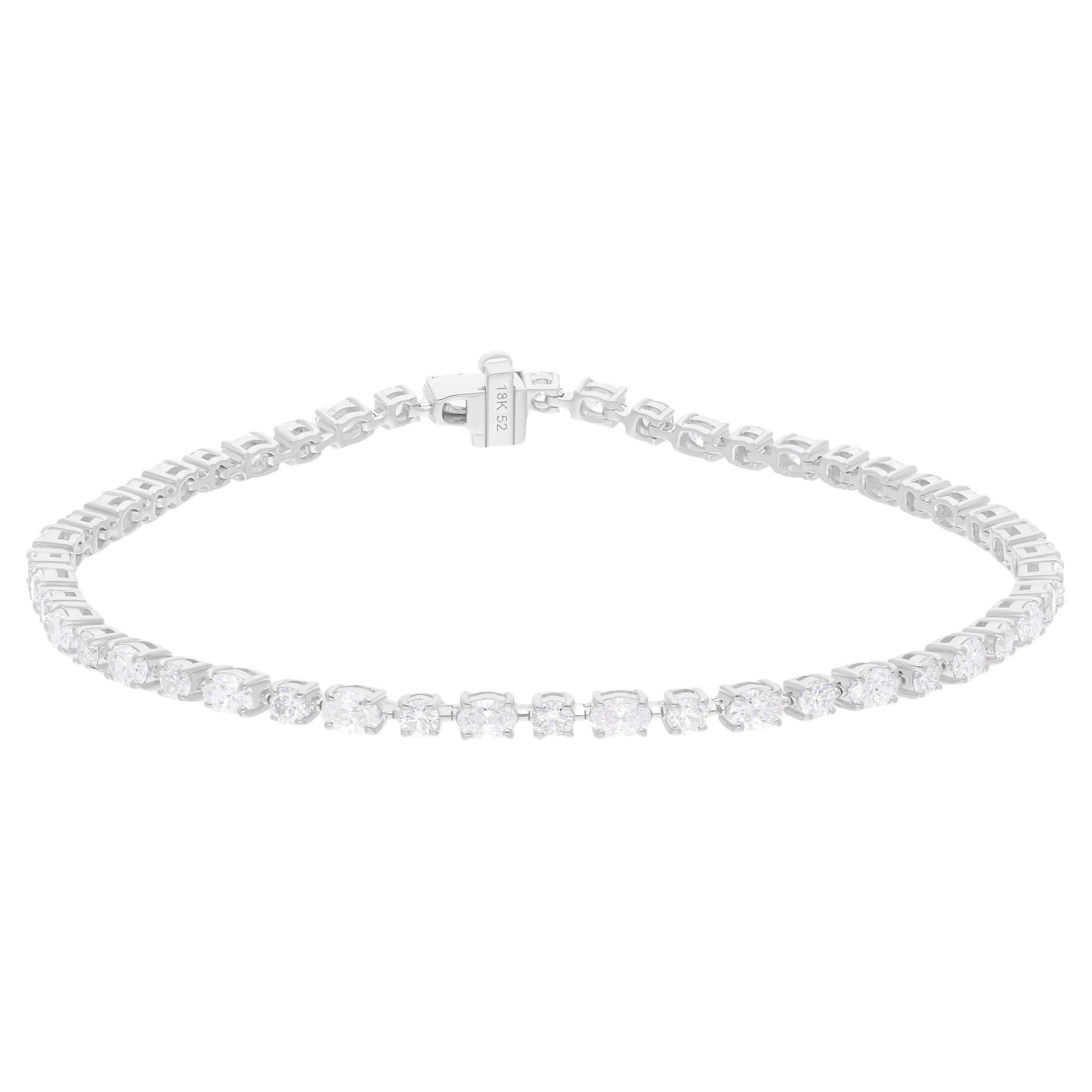 Pulsera de tenis de diamantes naturales multiforma 3,07 ct Oro blanco 18k Joyas finas
El diseño presenta una fila continua de diamantes ovalados y redondos meticulosamente engastados, que ofrecen el máximo brillo desde todos los ángulos.
Los