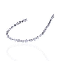 Multi Shape 5.80 Carat Diamond bracelet in G colour S I quality set in 18kt gold