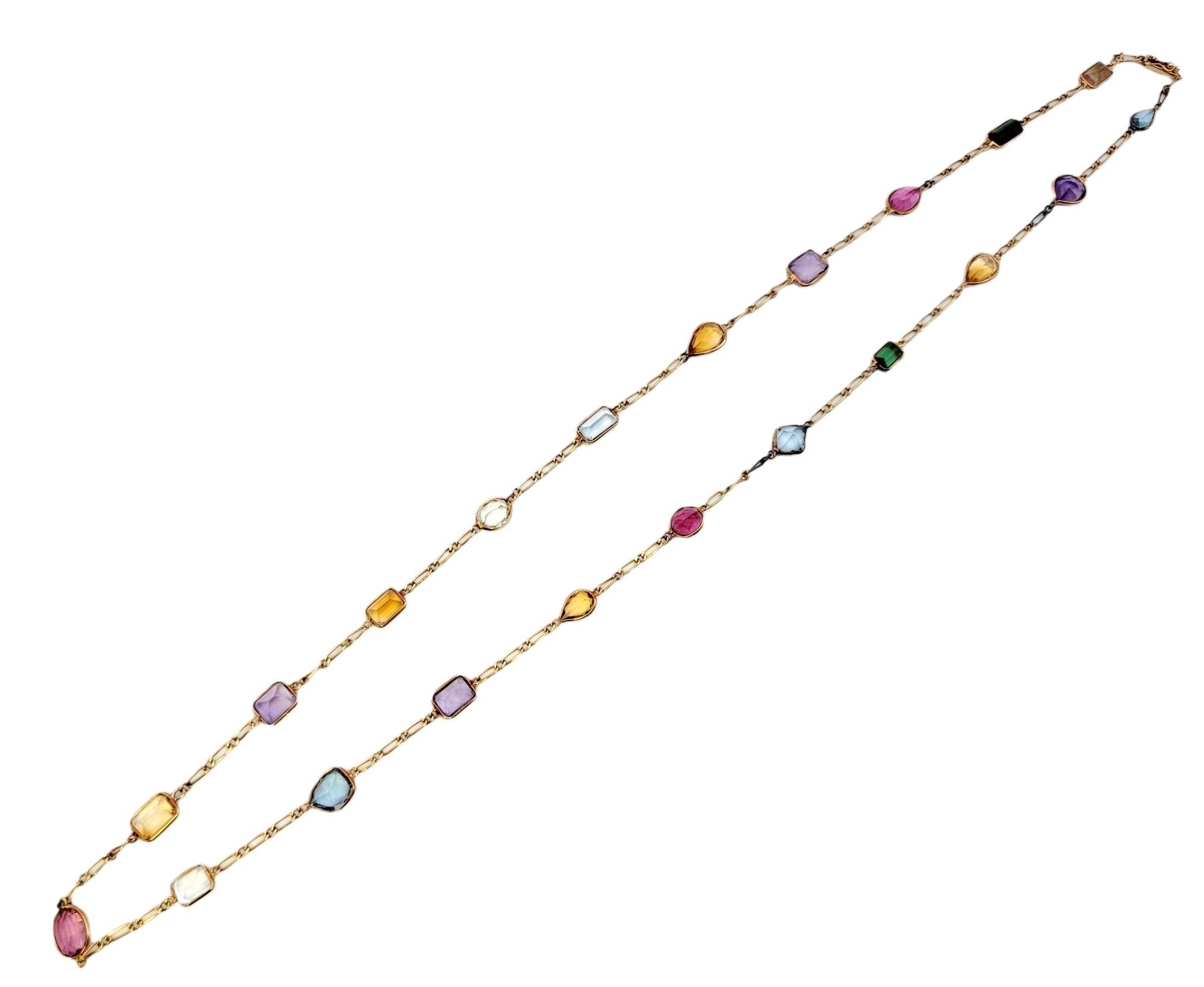 Multi Shape Colorful Multi Gemstone Station Necklace in 18 Karat Yellow Gold In Good Condition For Sale In Scottsdale, AZ
