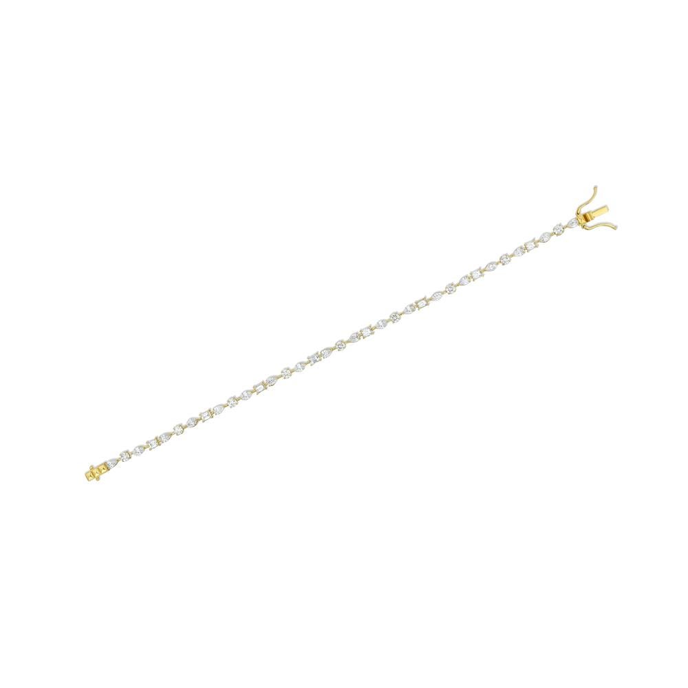 Thirty-five diamonds of varied shapes create a timeless, special bracelet.  Showcasing the pure beauty of diamonds and different diamond cuts, this 18k yellow gold multi-shape diamond bracelet is exquisite.  