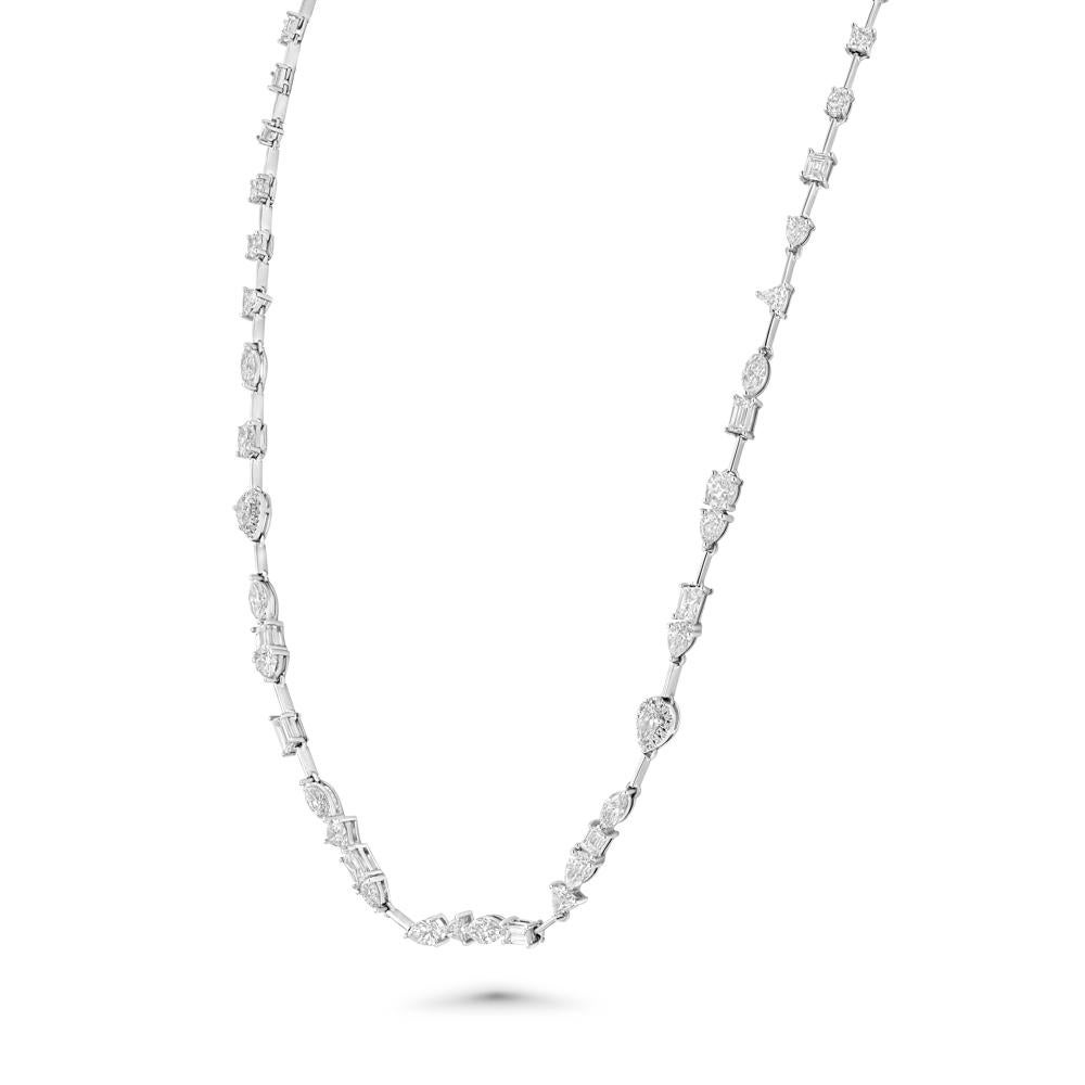 Our 18k white gold Multi-Shape Diamond Necklace is an avant-garde beauty. With its diamonds coming in a variety of shapes and sizes, and falling in nonuniform configurations that leave the eyes constantly surprised with what’s next, this piece will