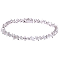 Pulsera de tenis con diamantes multiforma